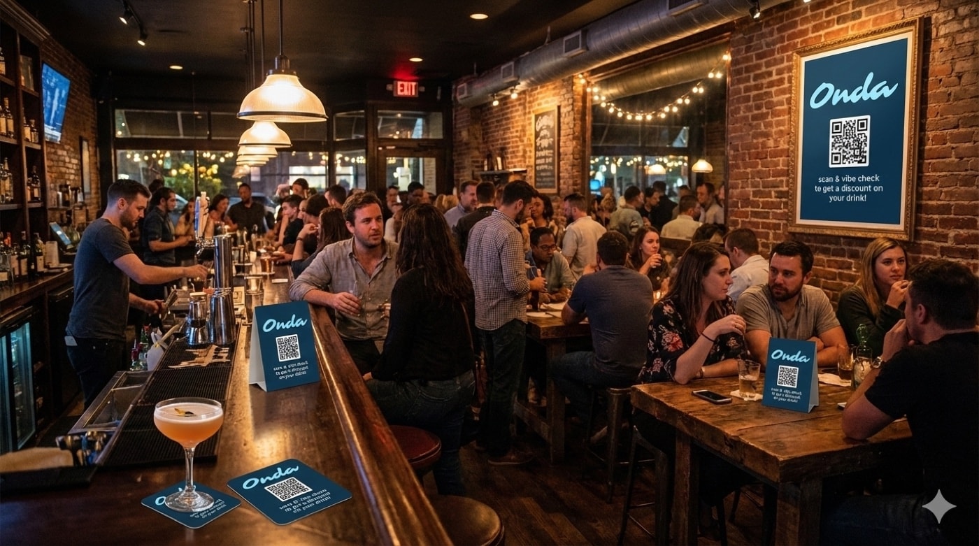 A busy bar with Onda codes on the tables